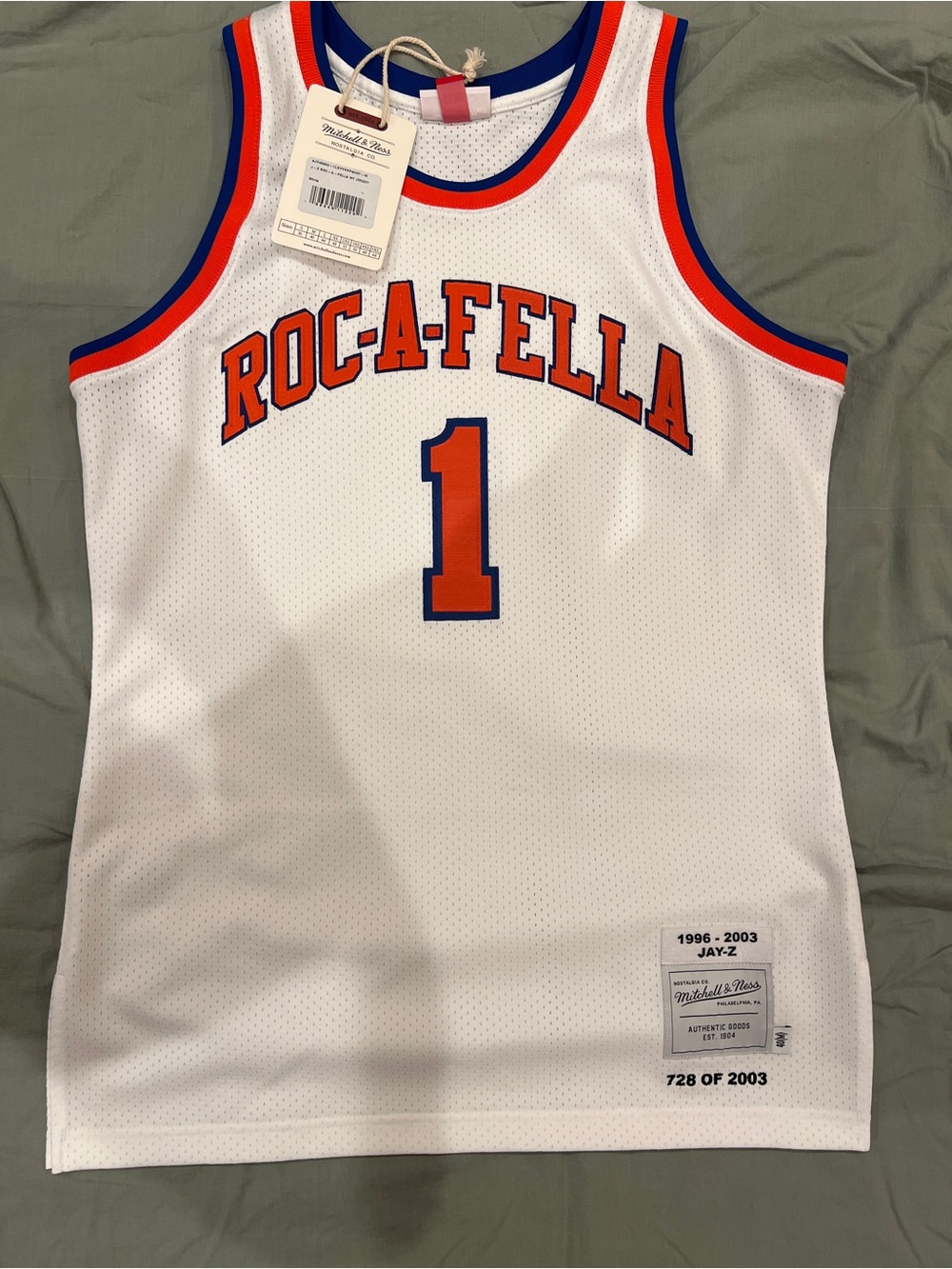 Mitchell & Ness White Roc-A-Fella #1 Jersey with Orange & Blue Trim